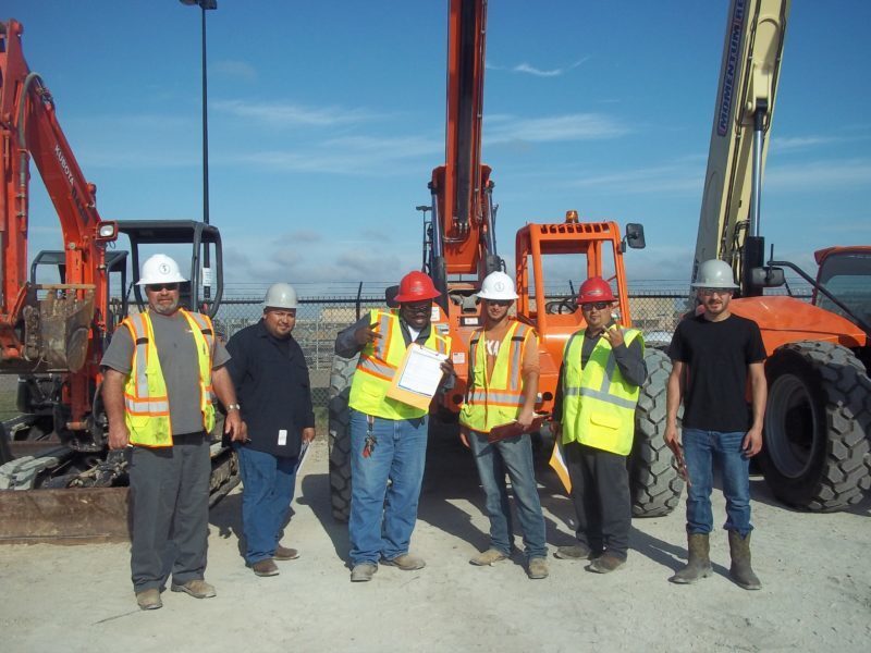 100_4513-e1507911795386 Contstruction team standing together